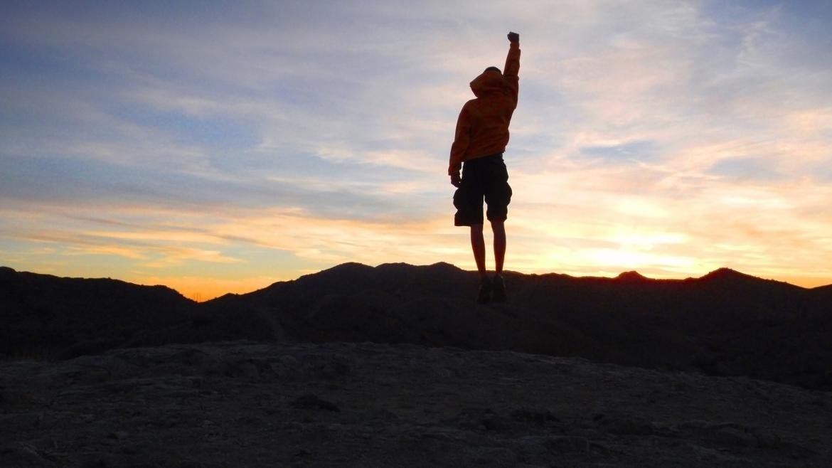 ASU student on mountain top