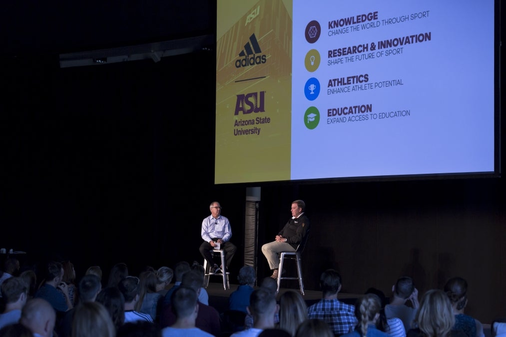Adidas North America CEO Mark King and ASU President Michael Crow speak at adidas headquarters