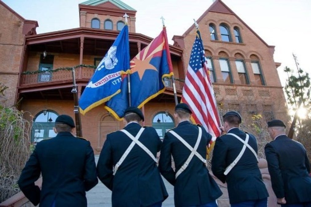 ASU honor guard enters Old Main on the Tempe campus.