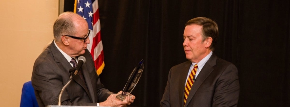 William Harris of Science Foundation Arizona honors ASU President Michael Crow at the 2nd annual Erich Bloch Lecture.